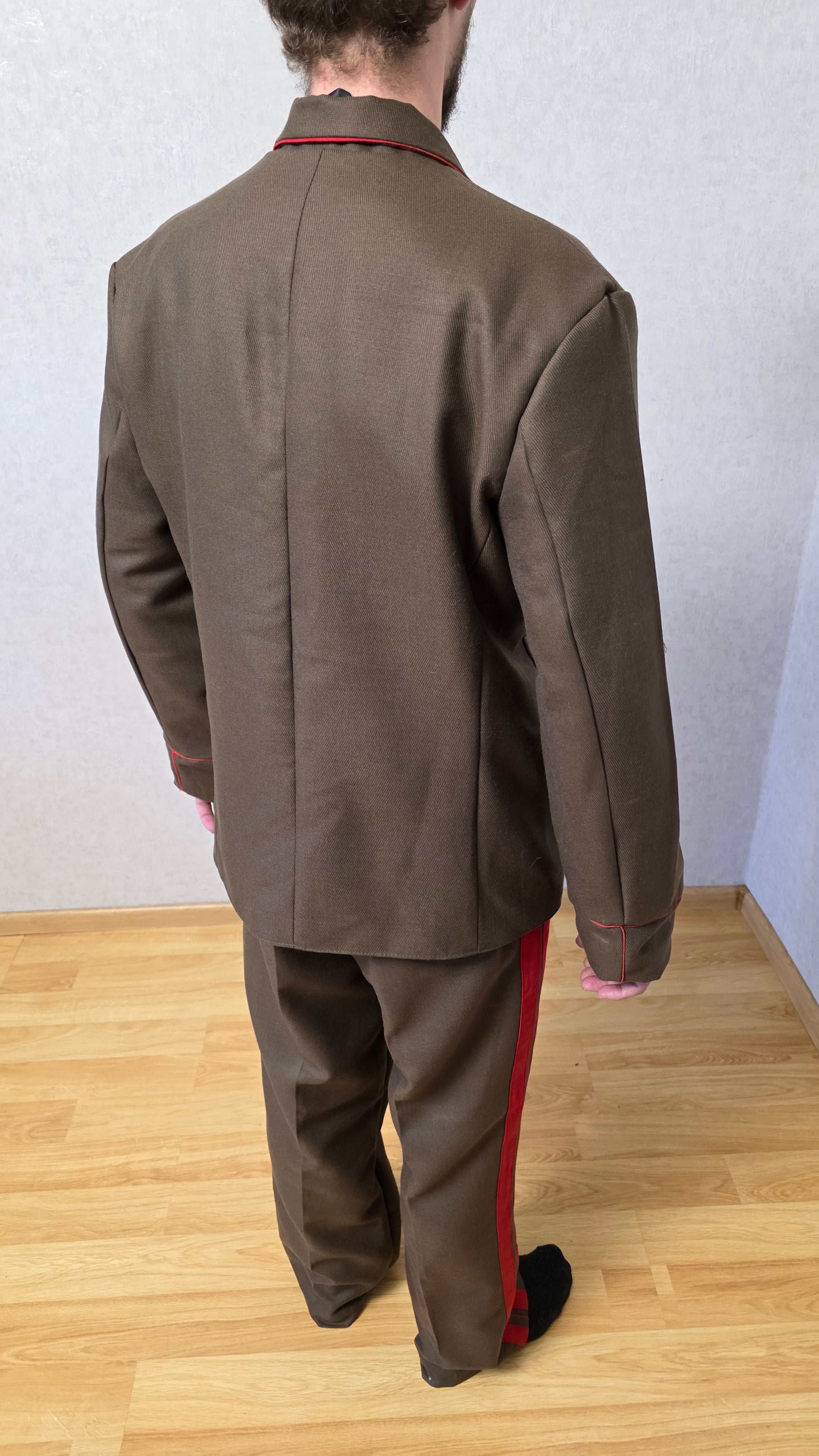 Vintage Soviet General Officer Ceremonial Dress Set from the USSR period, presented in classic khaki tone with a structured double-breasted jacket and matching red stripe trousers.